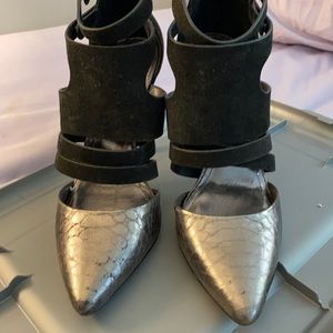 Black suede and grey embossed heel.